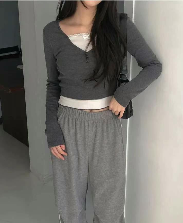 假兩件併色蝴蝶結衫