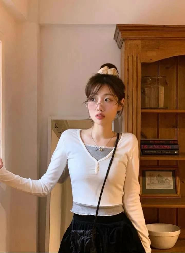 假兩件併色蝴蝶結衫