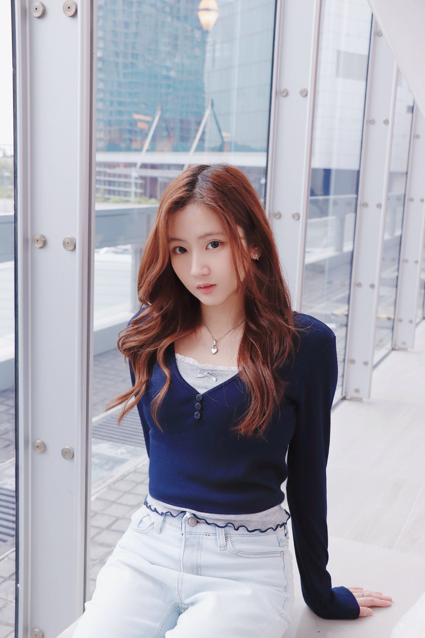 假兩件併色蝴蝶結衫